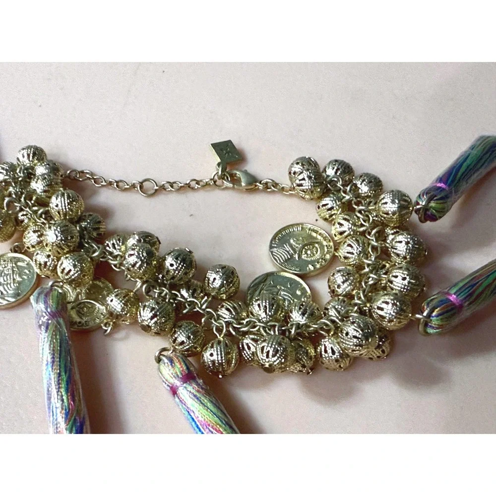 Gold Tone Boho Charm Bracelet with Coins‎ Tassels and Filigree Beads Multi Color